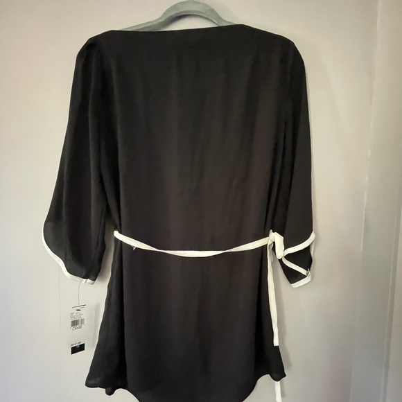 Black and white sheer shirt with a wrap tie belt. - Picture 5 of 5